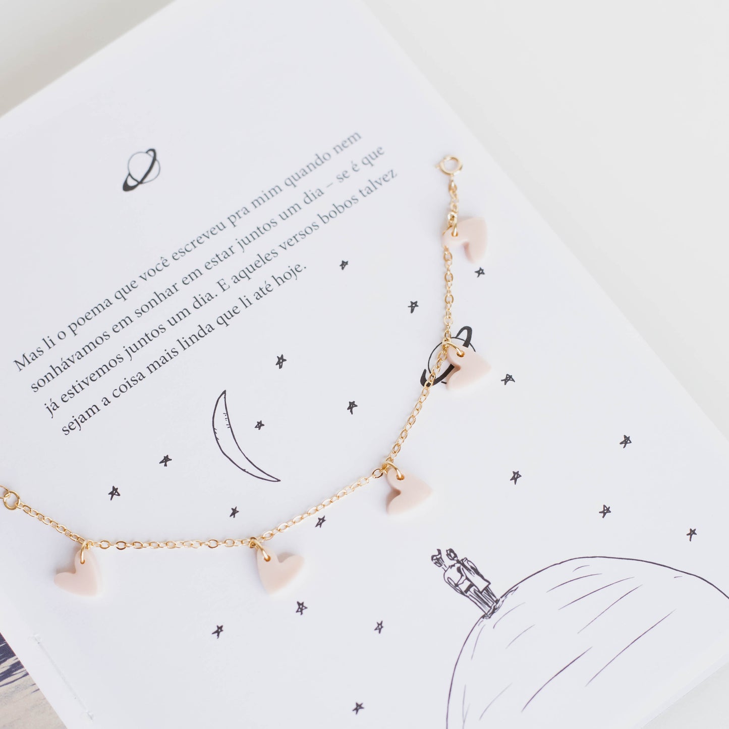 Pulseira corações rosinha folheada a ouro